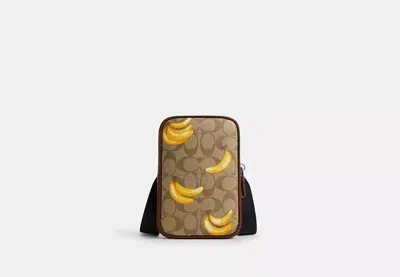 Coach Outlet Aden Crossbody In Signature Canvas With Banana Print In Brown