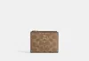Coach Outlet Bifold Wallet In Signature Canvas In Brown