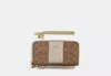 Coach Outlet Boxed Long Zip Around Wallet In Signature Canvas In Beige