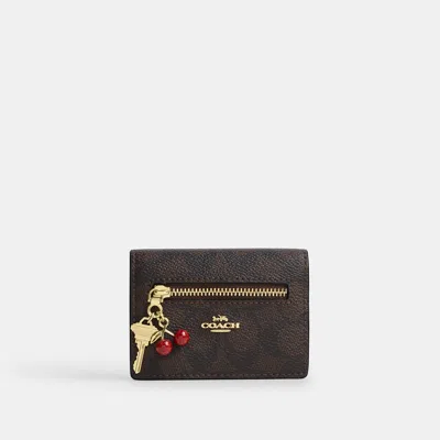 Coach Outlet Card Case With Charms In Gold/walnut/black