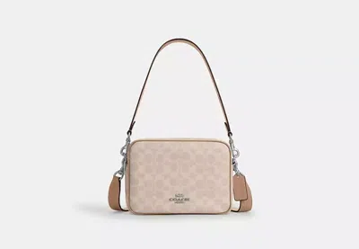 Coach Outlet Carey Crossbody Bag In Signature Canvas In Sand