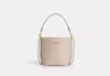 Coach Outlet City Bucket Bag In Signature Canvas In Beige