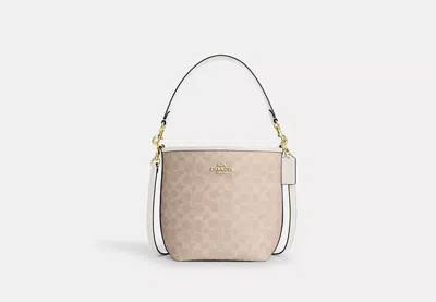 Coach Outlet City Bucket Bag In Signature Canvas In Beige