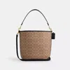 Coach Outlet City Large Bucket Bag In Signature Canvas In Beige
