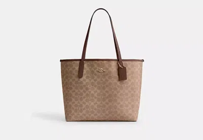 Coach Outlet City Tote Bag In Signature Canvas In Brown