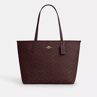 Coach Outlet City Tote Bag In Signature Canvas In Gold
