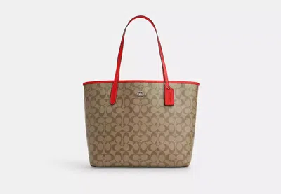 Coach Outlet City Tote Bag In Signature Canvas In Brown
