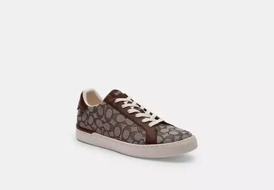 Coach Outlet Clip Low Top Sneaker In Signature Jacquard In Brown