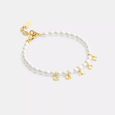 Coach Outlet Coach Charms Pearl Bracelet In Gold