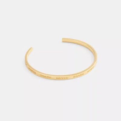Coach Outlet Coach Thin Cuff Bracelet In Gold