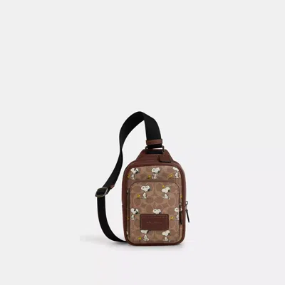Coach Outlet Coach X Peanuts Racer Sling Pack In Signature Canvas With Snoopy Print In Multi
