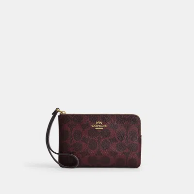 Coach Outlet Corner Zip Wristlet In Gold/black Currant