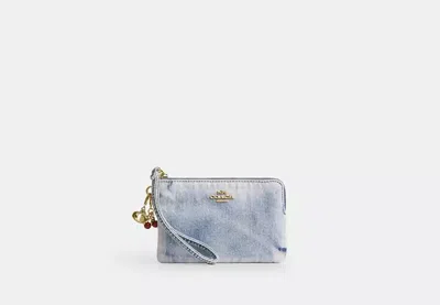 Coach Outlet Corner Zip Wristlet In Loved Denim With Charms In Blue