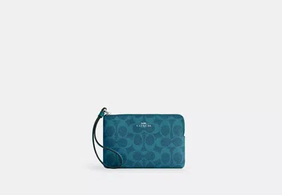 Coach Outlet Corner Zip Wristlet In Signature Canvas In Blue