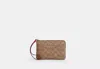 Coach Outlet Corner Zip Wristlet In Signature Canvas In Multi