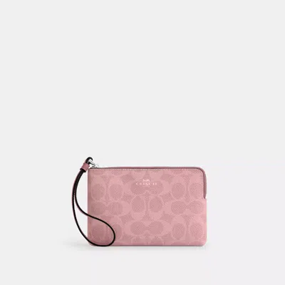 Coach Outlet Corner Zip Wristlet In Signature Canvas In Pink