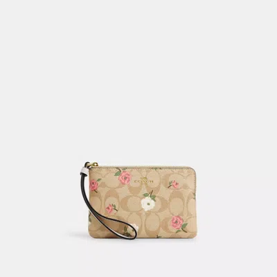 Coach Outlet Corner Zip Wristlet In Signature Canvas With Floral Print In Beige