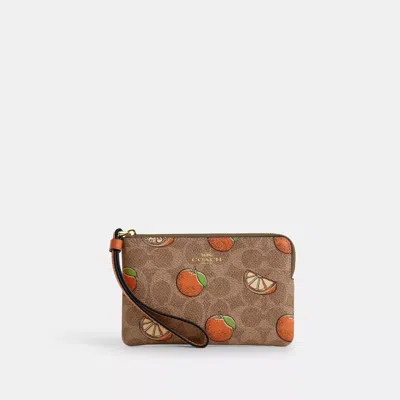 Coach Outlet Corner Zip Wristlet In Signature Canvas With Orange Print