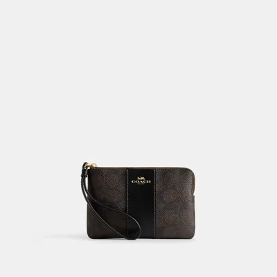 Coach Outlet Corner Zip Wristlet In Signature Canvas With Stripe In Brown
