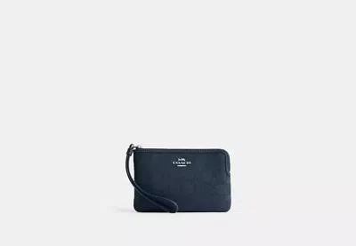 COACH OUTLET CORNER ZIP WRISTLET IN SIGNATURE JACQUARD