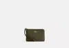 COACH OUTLET CORNER ZIP WRISTLET IN SIGNATURE JACQUARD