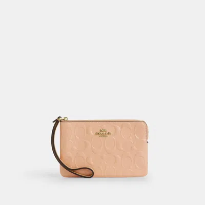 Coach Outlet Corner Zip Wristlet In Signature Leather With Charm In Pink