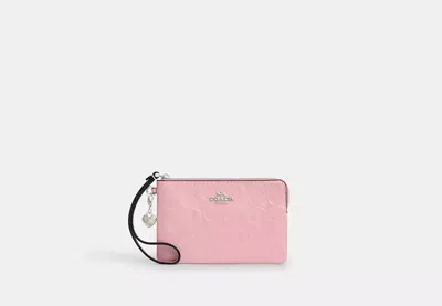Coach Outlet Corner Zip Wristlet In Signature Leather With Heart Charm In Pink