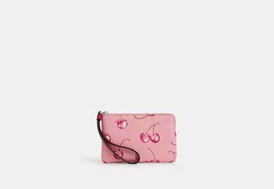 Coach Outlet Corner Zip Wristlet With Cherry Print In Pink