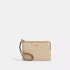 Coach Outlet Corner Zip Wristlet With Signature Canvas In Beige