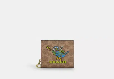 Coach Outlet Cosmic Coach Snap Wallet In Signature Canvas With Rexy Print In Beige