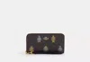 Coach Outlet Cosmic Long Zip Around Wallet In Signature Canvas With Robot Print In Multi