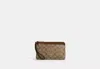 Coach Outlet Double Zip Wallet In Signature Canvas In Beige
