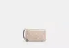 Coach Outlet Double Zip Wallet In Signature Canvas In Beige