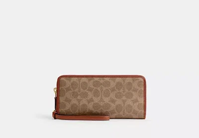 Coach Outlet Essential Continental Wallet In Signature Canvas In Brown