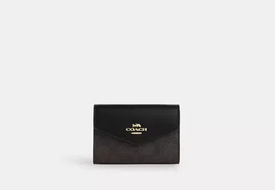 Coach Outlet Flap Card Case In Signature Canvas In Beige