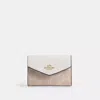 Coach Outlet Flap Card Case In Signature Canvas In Multi
