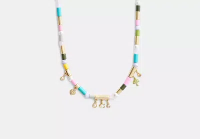 Coach Outlet Heart Multi Charm Beaded Necklace In Yellow