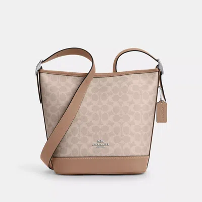 Coach Outlet Jude Bag In Signature Canvas In Sand