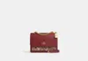 Coach Outlet Klare Crossbody Bag In Signature Canvas With Cherry Print In Beige/multi