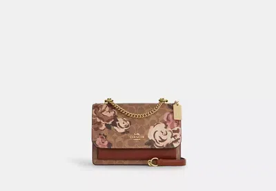 Coach Outlet Klare Crossbody Bag In Signature Canvas With Rose Print In Multi