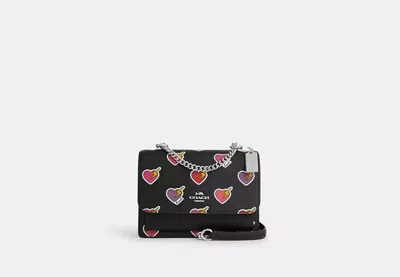 Coach Outlet Klare Crossbody Bag With Heart Bolt Print In Black