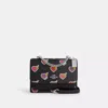 Coach Outlet Klare Crossbody Bag With Heart Bolt Print In Multi