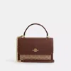 Coach Outlet Klare Top Handle Bag In Signature Canvas In Red