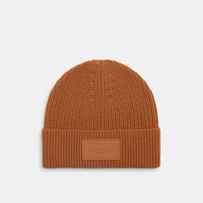 Coach Outlet Knit Beanie With Rubber Patch In Brown