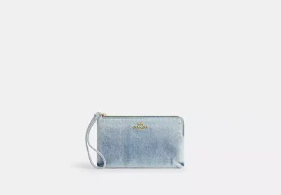 Coach Outlet Large Corner Zip Wristlet In Loved Denim In Blue