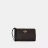 Coach Outlet Large Corner Zip Wristlet In Signature Canvas In Multi