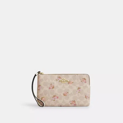 COACH OUTLET LARGE CORNER ZIP WRISTLET IN SIGNATURE CANVAS