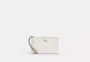 COACH OUTLET LARGE CORNER ZIP WRISTLET IN SIGNATURE CANVAS