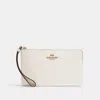 Coach Outlet Large Corner Zip Wristlet In Signature Canvas In White