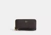 Coach Outlet Long Zip Around Wallet In Signature Canvas In Beige
